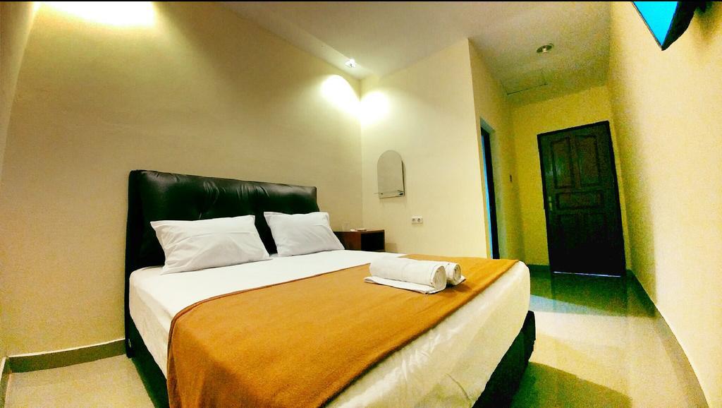 Quint Hotel Manado Exterior photo